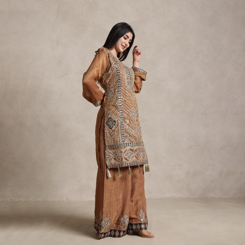 La Radi lightweight shimmer co‑ord with gotta patti and coding work detail