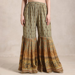 La Radi wedding guest shimmer sharara suit side profile