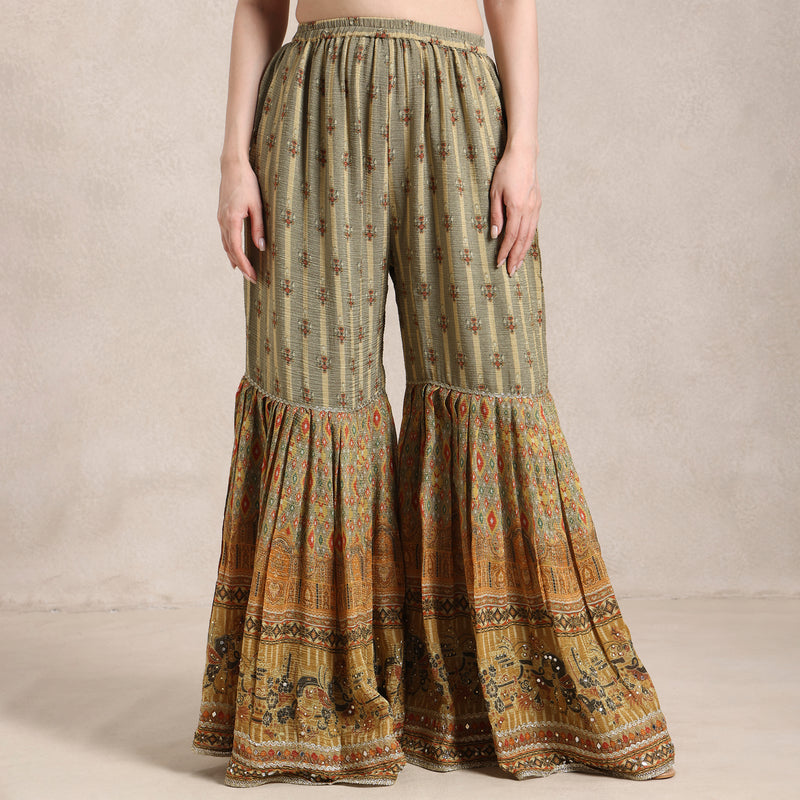 La Radi wedding guest shimmer sharara suit side profile