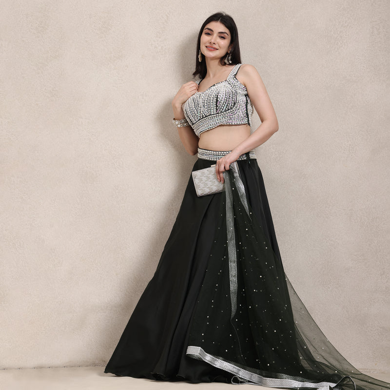 La Radi wedding guest armani satin lehenga with waist belt movement shot